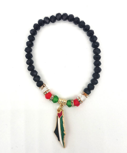 Black beaded bracelet with colorful charm on a white background