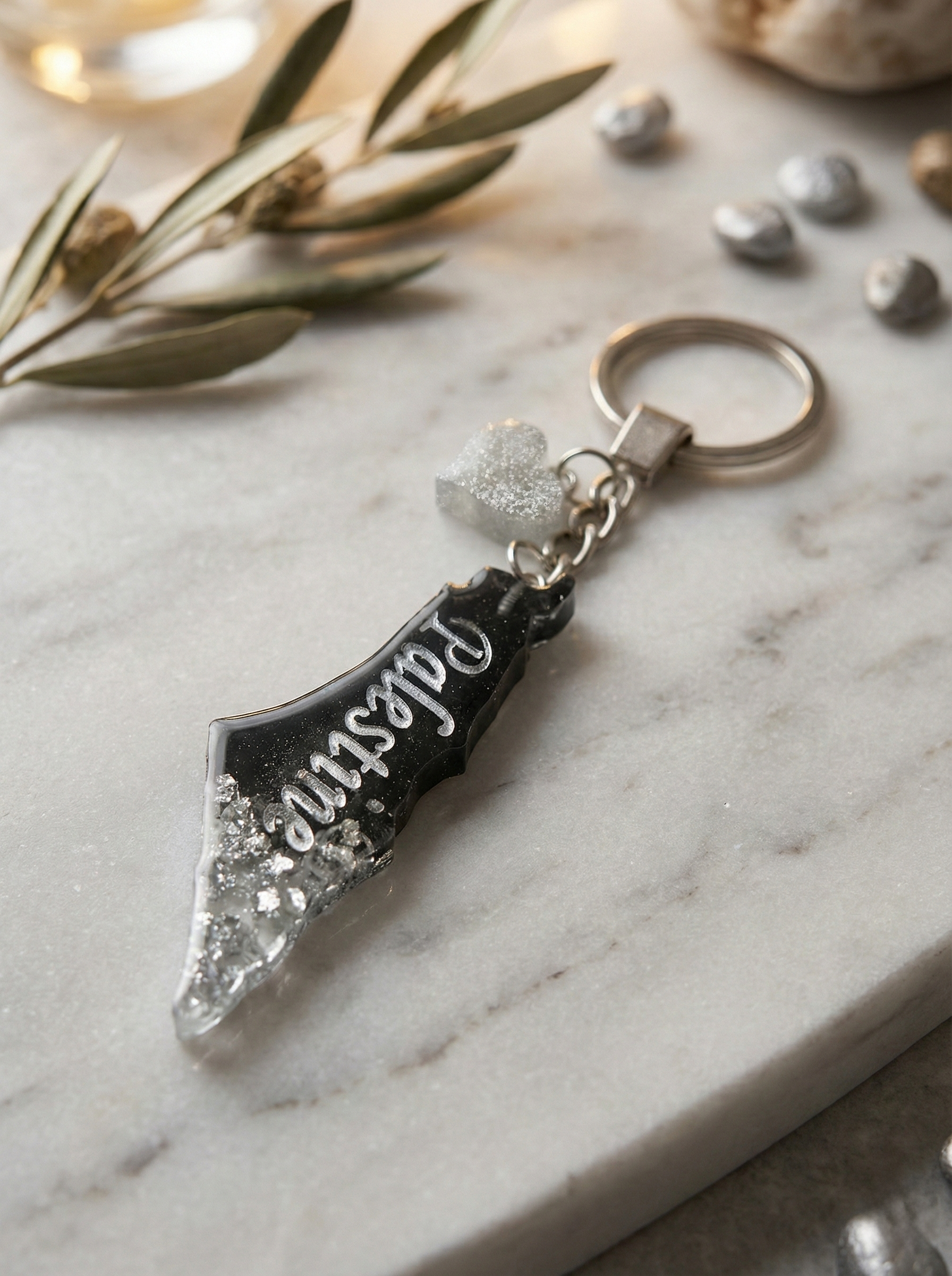 Palestine Resin Keychain – Black & Silver – Palestine Drinks Canada